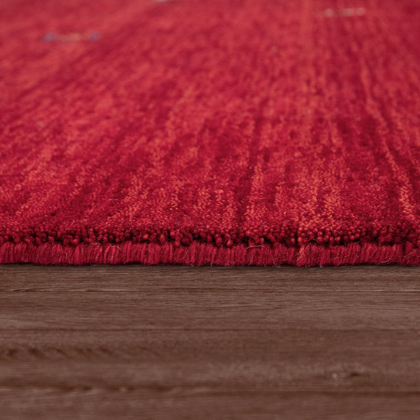 Bold Red Wool Rug Handcrafted Warmth & Comfort