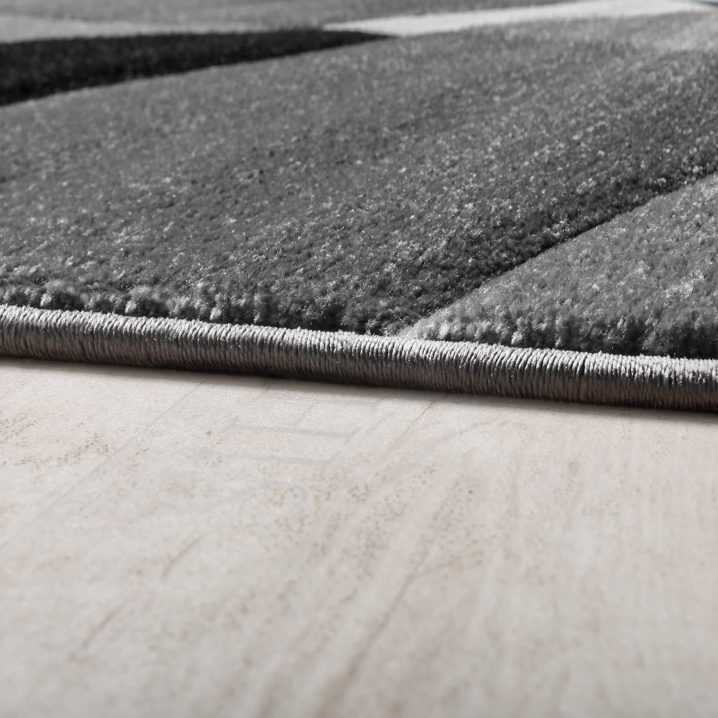 Elegant Black and White Indoor Rug with Soft Texture